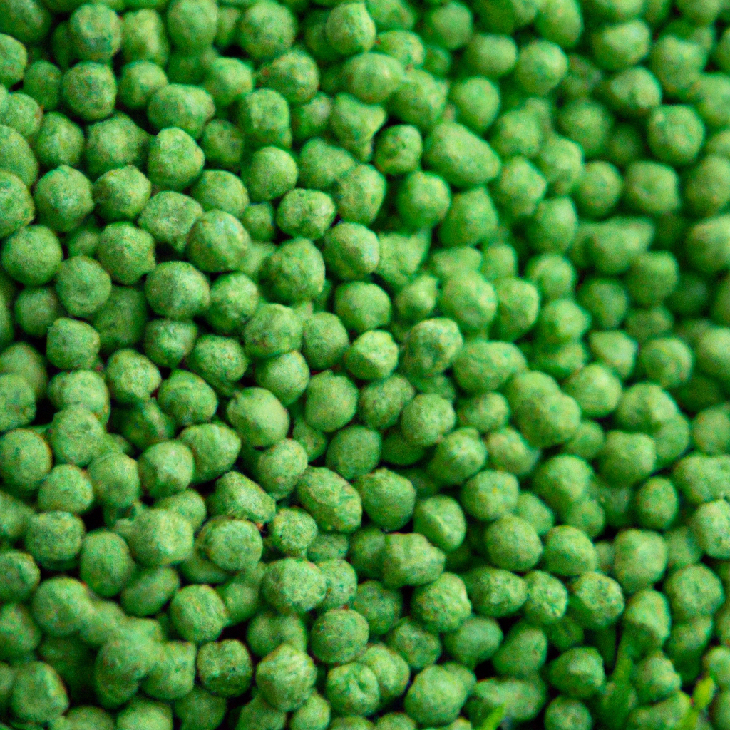 Bemesting met gelijkmatige korrelverdeling op groen gazon